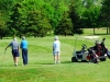 bigstockphoto_seniors_golfing_655417