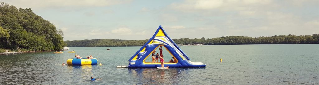 Image of MN fractional cabin ownership kids playing on water toys