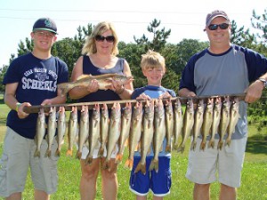 Family With lots of caught fish