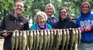 Three generations of women enjoy fishing opener together in Otter Tail County.
